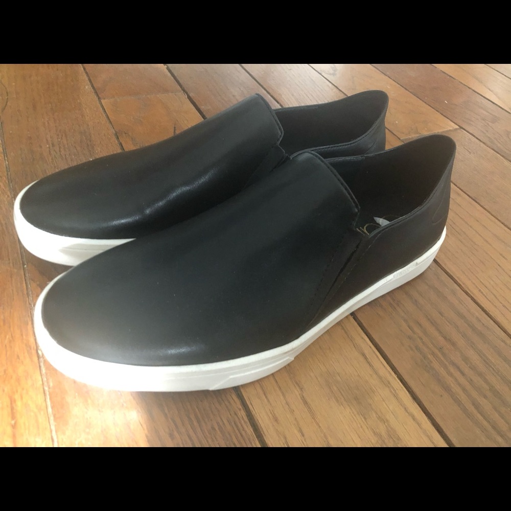 Black leather slip-ons